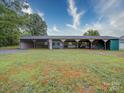 Large outbuilding with multiple bays, ideal for equipment storage or hobbies at 4115 Jenkins Rd, Marshville, NC 28103