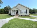 Charming one-story home with a covered front porch and well-kept lawn at 4285 Palmer Lloyd Rd, Lancaster, SC 29720