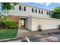 Charming two-story home with a combination of brick and siding, complemented by well-maintained landscaping at 5947 Quail Hollow Rd # A, Charlotte, NC 28210