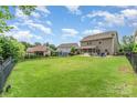 Large, fenced backyard offering ample space for outdoor activities and privacy at 755 Lagan Ct, Fort Mill, SC 29715