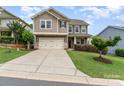 Charming two-story home with a two-car garage and inviting curb appeal at 755 Lagan Ct, Fort Mill, SC 29715
