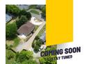 An aerial view of a home on a tree lined street at 933 Old Charlotte Rd, Concord, NC 28027