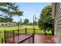 Spacious deck with railing, perfect for entertaining or relaxing outdoors at 103A N Tracy St, Kings Mountain, NC 28086