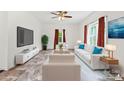 Bright, staged living room featuring modern furniture, a large TV, and neutral decor for a comfortable ambiance at 2949 Anderson Burgess Rd, Sharon, SC 29742