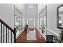 Bright, airy foyer featuring hardwood floors and white trim at 4500 Carrington Dr, Lancaster, SC 29720