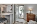 Welcoming foyer with open view to the front porch, the kitchen, and adjacent table at 4712 Avalon Forest Ln, Charlotte, NC 28269
