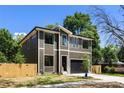 Charming exterior showcasing meticulous design with modern touches and a well-kept yard at 550 W Cama St, Charlotte, NC 28217
