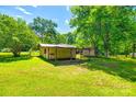 Expansive backyard featuring two sheds with ample storage space and potential at 1224 Martin Rd, Hickory Grove, SC 29717