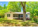 Lovely home featuring a well-manicured lawn and accessible wooden ramp at 1224 Martin Rd, Hickory Grove, SC 29717