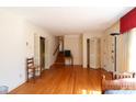 Spacious room featuring hardwood floors, bright natural light, neutral walls and direct staircase access at 170 Heritage Ln, Salisbury, NC 28147