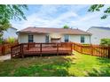 Well-maintained backyard featuring a wood deck perfect for outdoor entertaining and a partial fence at 1957 8Th Street Se Ln, Hickory, NC 28602