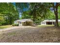 Large lot with carport and outbuildings at 208 Lipe Rd, Troutman, NC 28166