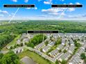 Aerial neighborhood view with grocery stores, restaurants 5-minute drive, Uptown Charlotte 18-minute drive at 4848 Fonthill Ln, Charlotte, NC 28210