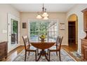 Cozy breakfast nook with natural light and view of the backyard at 5812 Morgan Park Dr, Monroe, NC 28110