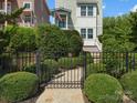 Inviting three-story home with manicured front yard and a walkway to the front door at 807 Herrons Ferry Rd, Rock Hill, SC 29730