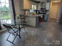 Bright kitchen features a breakfast bar, modern appliances, and ample counter space at 936 New Camp Creek Church Rd # 11, Kings Mountain, NC 28086