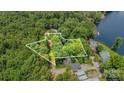 Beautiful aerial view of a tree-filled lot near the lake, ready for your dream home at 1102 Lake Montonia Rd, Kings Mountain, NC 28086