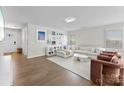 Spacious living room featuring modern decor, an inviting couch, and ample natural light at 2217 Goldwood Dr, Charlotte, NC 28215