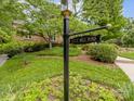 Street view showcasing the home's address and well-maintained lawn at 3225 Mill Pond Rd, Charlotte, NC 28226