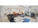 Bright living room features modern furnishings, a large window, and neutral color palette at 3721 Conway Ave, Charlotte, NC 28209