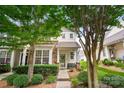 Attractive home exterior with manicured landscaping and a cozy front porch setting at 424 River Park Rd, Belmont, NC 28012