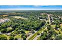Aerial view of property showing proximity to the City of Troutman, neighborhood, and surrounding landscape at 454 N Eastway Dr, Troutman, NC 28166