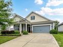 Well-maintained home featuring manicured landscaping and a spacious driveway leading to a garage at 505 Belle Grove Dr, Lake Wylie, SC 29710
