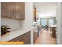 Modern kitchen with stainless appliances, granite countertops, and ample cabinet space at 5655 Arnold Way, Mount Pleasant, NC 28025