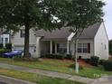 Attractive home featuring well-maintained landscaping, vinyl siding, and a lush green lawn at 2226 Elendil Ln, Charlotte, NC 28269