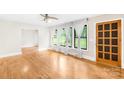 Bright living room featuring hardwood floors, white trim, and natural light at 7022 Lakeside Dr, Charlotte, NC 28215