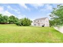 Expansive backyard featuring lawn and trees at 9641 Bellamy Nw Pl, Concord, NC 28027