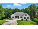 Beautiful single Gathering home with lovely yard and modern design at 167 Logan Crossing Dr, Davidson, NC 28036