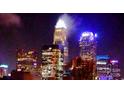 Nighttime skyline view showcases the city's vibrant lights and impressive architecture at 408 N Mcdowell St, Charlotte, NC 28204