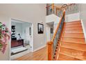 Elegant foyer with hardwood floors, staircase with iron spindles, and view of an office at 508 Whitehead Ct # 328, Fort Mill, SC 29708