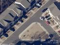 Aerial view of a residential neighborhood showcasing well-maintained homes, streets, and landscaped yards at 5324 Somerset Hill Ln, Charlotte, NC 28269