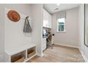 Cozy office featuring built-in shelving, desk area, and a bright window at 7101 Short Stirrup Ln, Mint Hill, NC 28227