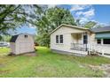 View of the side and front exterior of this cozy home with a shed at 8334 Oaktree Rd, Sharon, SC 29742