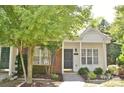 Charming townhouse with well-maintained landscaping, offering a welcoming curb appeal at 125 Lynch Cir, Mooresville, NC 28117