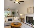 Inviting living room with fireplace, ceiling fan, and neutral decor at 2015 Downey St, Rock Hill, SC 29732