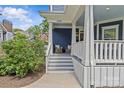 Inviting front porch with seating area offering a relaxing outdoor space at 2315 Winthrop Ave, Charlotte, NC 28203