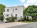 Contemporary home showcasing modern architecture and landscaping, near a street intersection at 314 Viburnum Way Ct, Charlotte, NC 28208