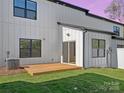 Cozy wooden deck off the back of the home, perfect for outdoor entertaining at 8315 Adrian Ct, Charlotte, NC 28270