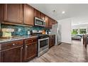 Beautiful kitchen showcasing stainless steel appliances, sleek cabinets, and a stylish backsplash at 8316 Waxhaw Hwy, Waxhaw, NC 28173