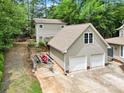 Spacious two-car garage with additional storage or workspace, offering convenience and functionality at 832 Kemp Rd, Mooresville, NC 28117