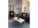 Comfortable living room featuring stylish furniture, elegant decor, and a bright, airy atmosphere at 11421 Kingfisher Dr, Charlotte, NC 28226