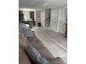 Spacious living room flowing into kitchen, with modern finishes and ample natural light at 118 Fir St, McAdenville, NC 28101