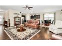 Open-concept living room flows into the dining and kitchen areas, providing ample space for entertaining guests and Gathering at 12014 Belmont Mansion Dr, Charlotte, NC 28273
