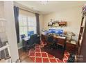 Bright office space with built-in shelving, perfect for working from home at 3416 Yarmouth Ln, Gastonia, NC 28056