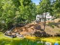 Scenic waterfront home with private dock offering serene views and direct lake access at 402 Wildlife Rd, Troutman, NC 28166