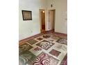 Cozy bedroom with an eye-catching rug and natural light, ready for your personal touch at 6000 Amberly Ln, Charlotte, NC 28213